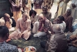 His Holiness Satsvarupa Gosvami, second from the left, meets with guests on the front lawn of the Mexico City Hare Krishna Temple.
