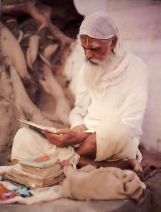 Pundit studying the scriptures in Indian Village 1976.