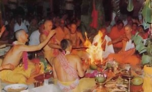 Traditional fire sacrifice: Yasodinandana Swami (second from left) leads a sacrifice inaugurating the Fiji temple.