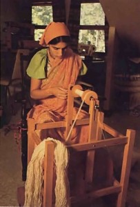 Mother Satyabhama spins wool into yarn at Gita-Nagari 1977