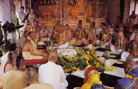 Inotiation into Krsna consciousness takes place during a joyful ceremony. At left. His Divine Grace Bhavananda Goswami Visnupada initiates disciples at a temple devotees recently constructed at their New Govardhana farm in New South Wales.