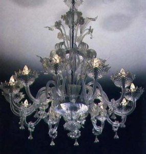A lotus-shaped crystal chandelier with dew drop pendants. Marco designed the bookcase for the Krsna asrama in Valencay. France.