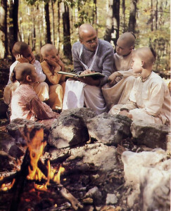 Bhurijana and the boys enjoy a story about Krsna playing in the woods with His cowherd friends