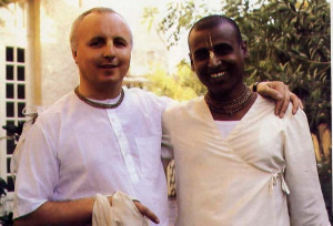 An international staff headed by Welsh-born Gunarnava dasa (left), Bengali-born Tapomaya dasa (right), and Cuban-born Krta-karma dasa, manage the Krsna-Balarama project. In mid-March they welcome hundreds of devotees from the West who visit Krsna-Balarama each year during a month-long festival. At far right , on a chilly morning during this year's festival, devotees hear a class on Srimad-Biragavaram in the temple courtyard.
