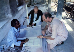 He consults with His Holiness Surabhirabhipalayantam Swami and a local craftsman at the Vrndavana construction site.