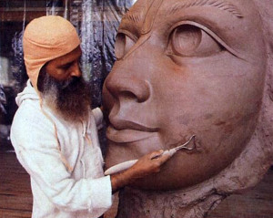 Gopala Goswami, a sculptor from Bengal who has taught art and environmental sculpture at the University of Arkansas, finishes the model for the face of Lord Caitanya