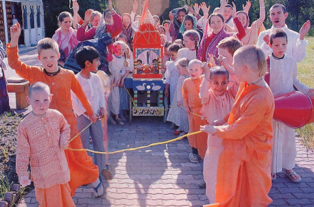 Both children and adults enjoy broadcasting the glories and pastimes of Lord Krsna with a Ratha-yatra parade