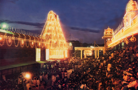 Thousands of pilgrims await the appearance of the professional Deity during one of Tirumala's numerous festivals.