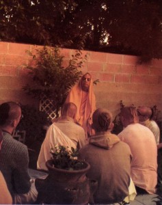 Srila Prabhupada preaching to devotees in his garden at ISKCON New Dvarka (Los Angeles) 1974.