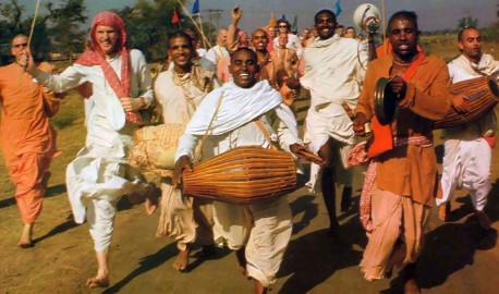 ISKCON devotees from around the world hold sankirtan, congregational chanting of Hare Krishna, in Mayapur, India, the birthplace of Lord Caitanya Mahaprabhu. 1974.