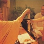 Srila Prabhupada initiates his disciples in the authorized Vedic way of spiritual understanding.