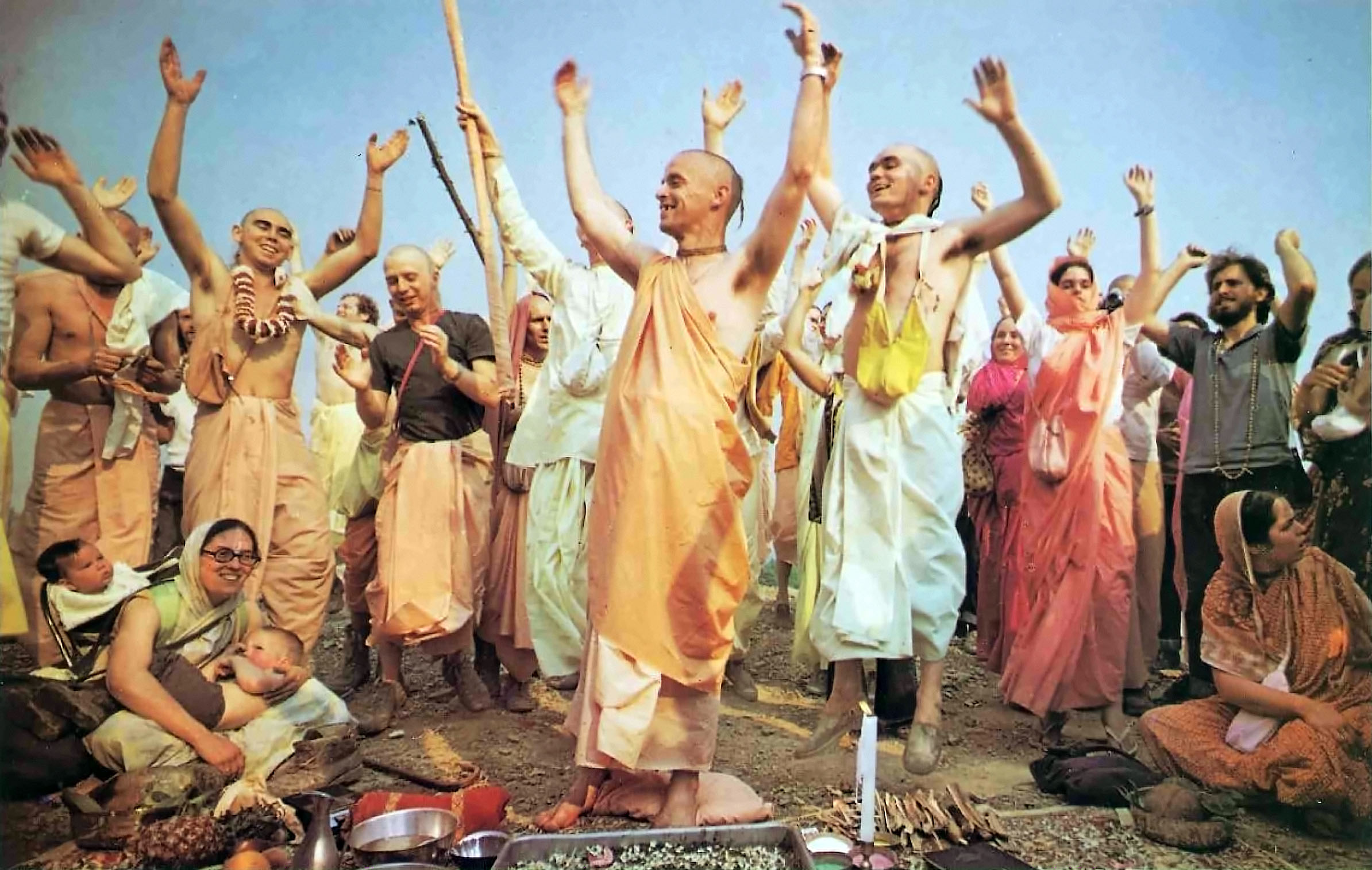 ...leads devotees in ecstatic kirtan (congregational chanting of the Hare K...