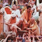 ISKCON devotees distributing Lord Jagannatha's maha-prasadam at Ratha-yatra festival. 1974.