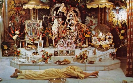 ISKCON Devotee offers Prasadam to Radha Krishna Deities. 1974.