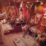 A pujari (priest) makes an offering to the Deity of Lord Jagannatha at an ISKCON temple. 1975.