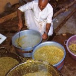 In the Nairobi Hare Krishna temple's special outdoor kitchen. 1975.