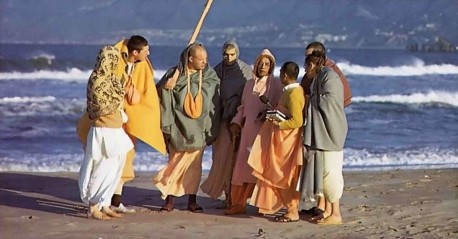 Srila Prabhupada and disciples on morning walk at Venice Beach CA. 1975.