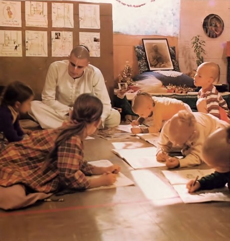 ISKCON Gurukula students studying on floor. 1976.