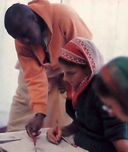 Howard Sewell (Haravapu dasa) points out a drawing technique to Sandra Griffis (Saiijaya-devi dasi), an art graduate from Goddard College.  - 1977