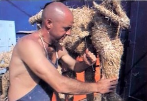 ISKCON devotee makes doll from straw for diorama exhibit - 1977