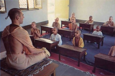 Headmaster Yasodanandana Swami spends most of his time--both in class and out guiding the boys. Here he's helping some ten-year-olds learn Sanskrit, so that they can dive deep into the ancient Vedas, "the eternal wisdom."