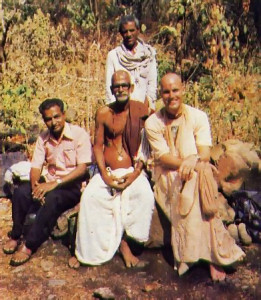 About to embark on their climb to Ahovalam, lndradyumna Swami (far right) poses with the village brahmana from Lower Ahovalam (center), Mr. T.N. Srinivas(left), principal of Hyderabad's largest public school , and their "hatchet-guide" (standing).