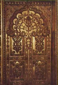 This gold-leafed teakwood door leads to the main hall from Srila Prabhupada's study.