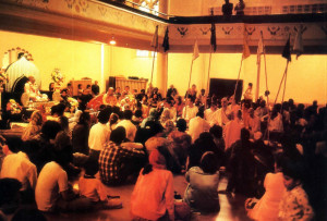 Before initiating new disciples at a recent ceremony in the Montreal temple (above), Srila Gopala Krsna Goswami (on red velvet seat of honor) explains the relationship between guru and disciple in Krsna consciousness.
