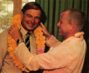 Australia's acting prime minister, Douglas Anthony (left), receives a sacred garland from Srila Bhavananda Goswami, one of the Hare Krsna movement's present spiritual masters.