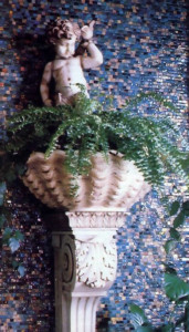 The cherubatop- a-pedestal and tilework