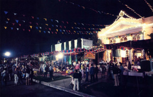 Devotees and guests mingle in front of the temple during the celebration or Janmastasi, Krsna's appearance anniversary.