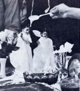 A.C. Bhaktivedanta Swami bathes the Radha Krishna deities in milk before installation. 
