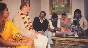 Mahatma dasa talks with ISKCON life members, the Duvvuri family.