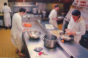 In the immaculate temple kitchen, devotees prepare sumptuous vegetarian dishes for the Hare Krishna Food for Life program